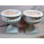 A pair of fiberglass garden urns, H.70cm