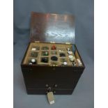 A 19th century oak medicine cabinet, with hinged lid compartment above two drawers, H.46 W.47 D.32cm