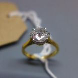 A ladies 18ct yellow gold solitaire diamond ring, inset with round brilliant cut diamond, approx.