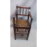 A 19th century oak child's high chair