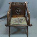 A 19th century oak Glastonbury chair