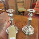 A pair of silver plated telescopic candlesticks