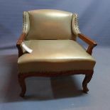 A 20th century French walnut armchair, having grey leather stud bound upholstery