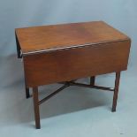 A 19th century mahogany drop leaf side table, with single drawer, raised on square legs, joined by X