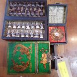 A Chinese compass in box, a Chinese travelling chess set and a Chinese vanity box