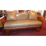 A 20th century bespoke fruitwood two seater camel back sofa, with grey leather stud bound