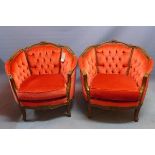 A pair of 20th century French walnut tub chairs, with button back velour upholstery, raised on