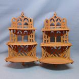 A pair of teak wall hanging three tier whatnots, H.94 W.56 D.26cm