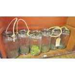 Six glass planters with rope handles, H.30cm