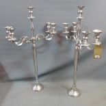 A pair of chrome four branch candelabra, H.100cm