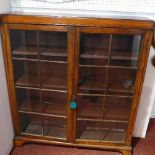 A 19th century mahogany bookcase with two glazed doors raised on bracket feet. H.120 W.108 D.26cm