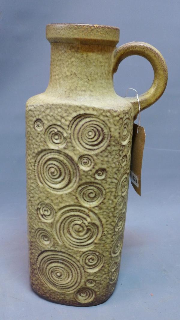 A large West German pottery vase, decorated with swirls