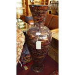 A tall Contemporary brown glass mosaic floor vase, H.125cm