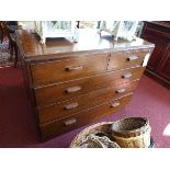 A mid 20th century mahogany chest of two short over three long drawers, raised on plinth base,