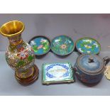 A Chinese terracotta tea pot and cloisonne vase, three cloisonne dishes and a Persian enamel card