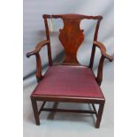 An 18th century Georgian mahogany open elbow chair, with horse hair stuffed seat, raised on block