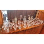 A collection of glass and crystal, to include decanters, candlesticks, sundae dishes, etc.