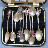 A boxed set of five silver spoons with City of London terminals, hallmarked Birmingham, (one