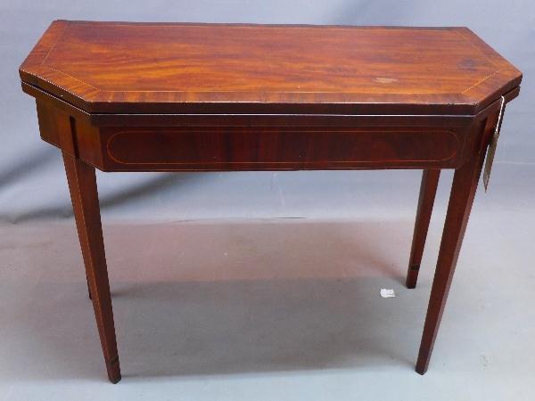 A 19th century mahogany card table, with boxwood inlay, raised on tapered legs, H.74 W.93 D.46cm