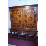A Dutch Oyster-Veneered Walnut, Ivory, Ebony and marquetry cabinet-on-stand, the rectangular moulded