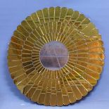 A Contemporary mirror in the form of a sunflower, with bevelled plates