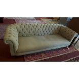 A grey three seater Chesterfield sofa, L.200 H.65 D.85cm