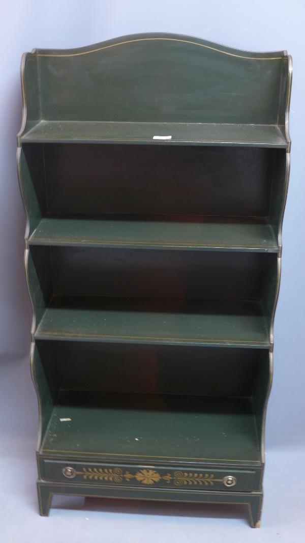 A 20th century green painted waterfall bookcase, with single drawer, raised on tapered feet, H.121