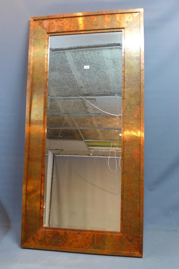 A Contemporary copper clad mirror, with bevelled plate, 180 x 90cm