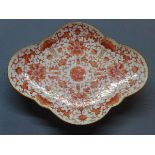 A 19th century Chinese porcelain dish, of cartouche form, with orange floral decoration, H.6 W.29