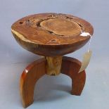 An Indonesian reclaimed teak stool, H.50cm