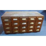 A mid 20th century light oak filing cabinet, H.44 W.90 D.42cm