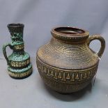 A large West German pottery vase, H.32cm, together with a German Jopeko vase, H.31cm