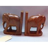 A pair of treen bookends in the form of elephants, H.19cm