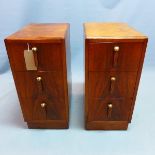 A pair of Art Deco burr walnut pedestal chests, with three drawers, raised on plinth bases, H.68 W.