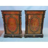 A pair of late 19th century French ebonised and boulle cabinets, with marble tops, ormolu mounts,