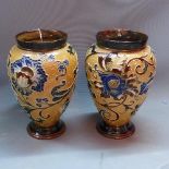 A pair of late 19th century Doulton Lambeth stoneware vases by Mark Marshall, polychrome decorated