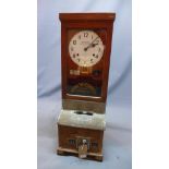 An early 20th century oak National Time Recorder/clocking in machine, H.99 W.34 D.28cm