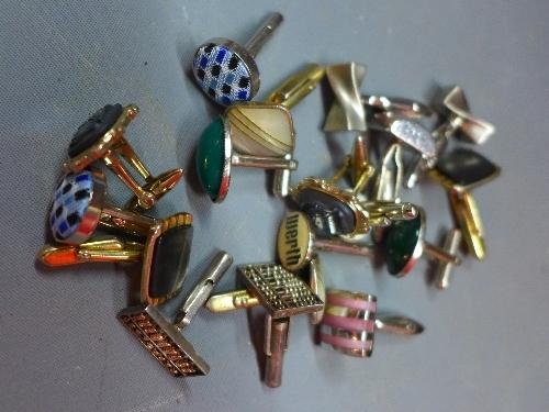 A collection of nine Art Deco gentleman's cufflinks, to include a pair of silver cufflinks in the