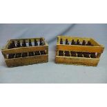 A collection of 48 vintage French glass beer bottles, in wooden crates