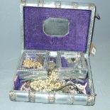 A collection of costume jewellery, in an Indian white metal jewellery box in the form of a book