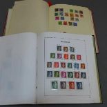 A collection of German stamps in two albums, to include Third Reich stamps