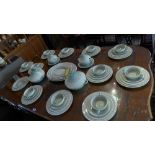 A large Art Deco Susie Cooper dinner service, comprising tureens, plates, soup bowls, etc.