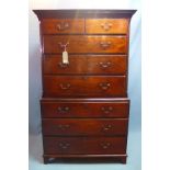 A late 19th century mahogany chest on chest, with two short over six long drawers, raised on bracket