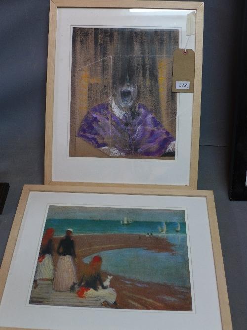 A Surrealist print together with a print of a French beach scene, H.36cm W.30cm