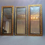 A pair of Contemporary gilt mirrors together with one other