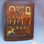 A Russian icon in three registers depicting Jesus, The Mother of God and Christ, St Nicholas of