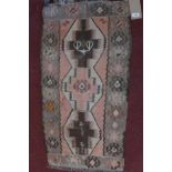 A mid 20th century Turkish kilim rug, 110 x 57cm