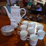 A Royal Crown Derby Brittany pattern tea set comprising of a teapot, milk jug, eight cups and
