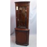 A mid 20th century mahogany corner cabinet