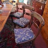 A set of six Regency mahogany dining chairs, with damask upholstered drop in seats, raised on